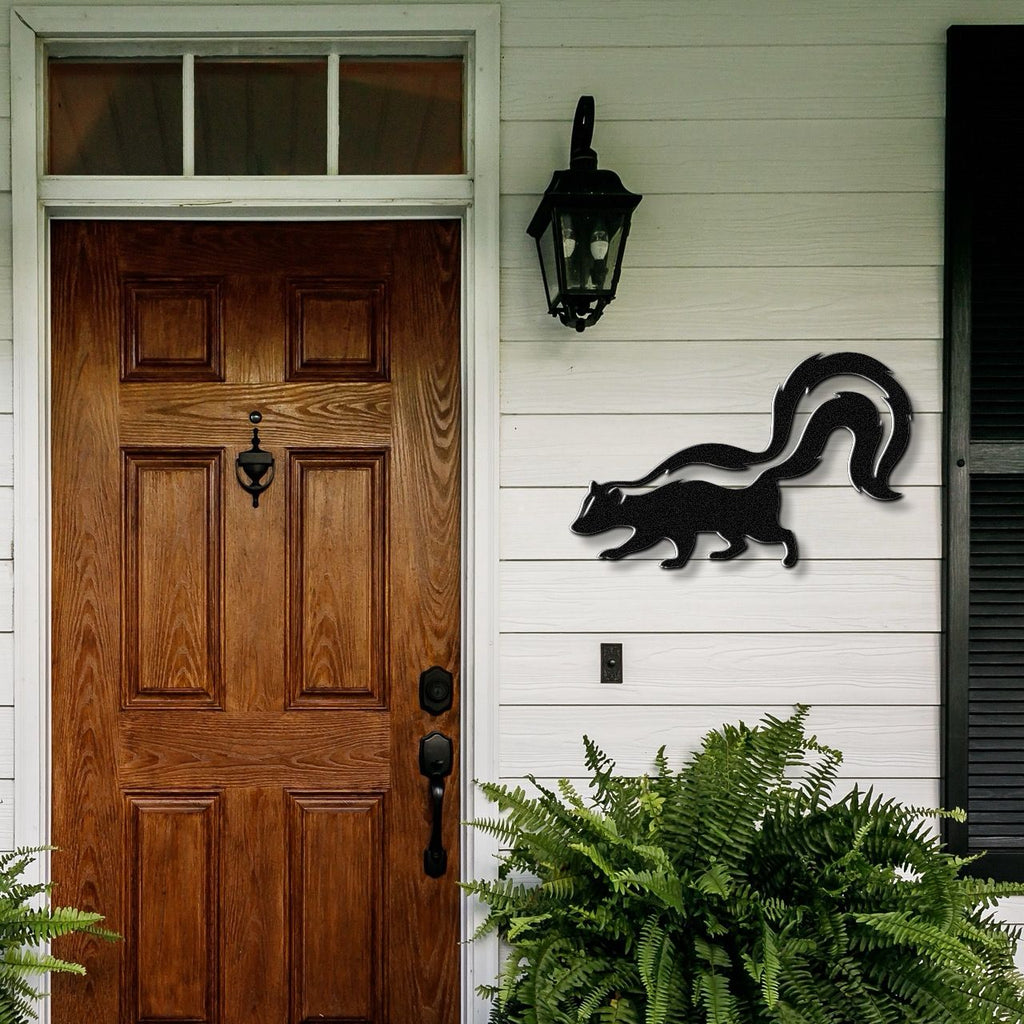 Sneaky Skunk Metal Wall Art