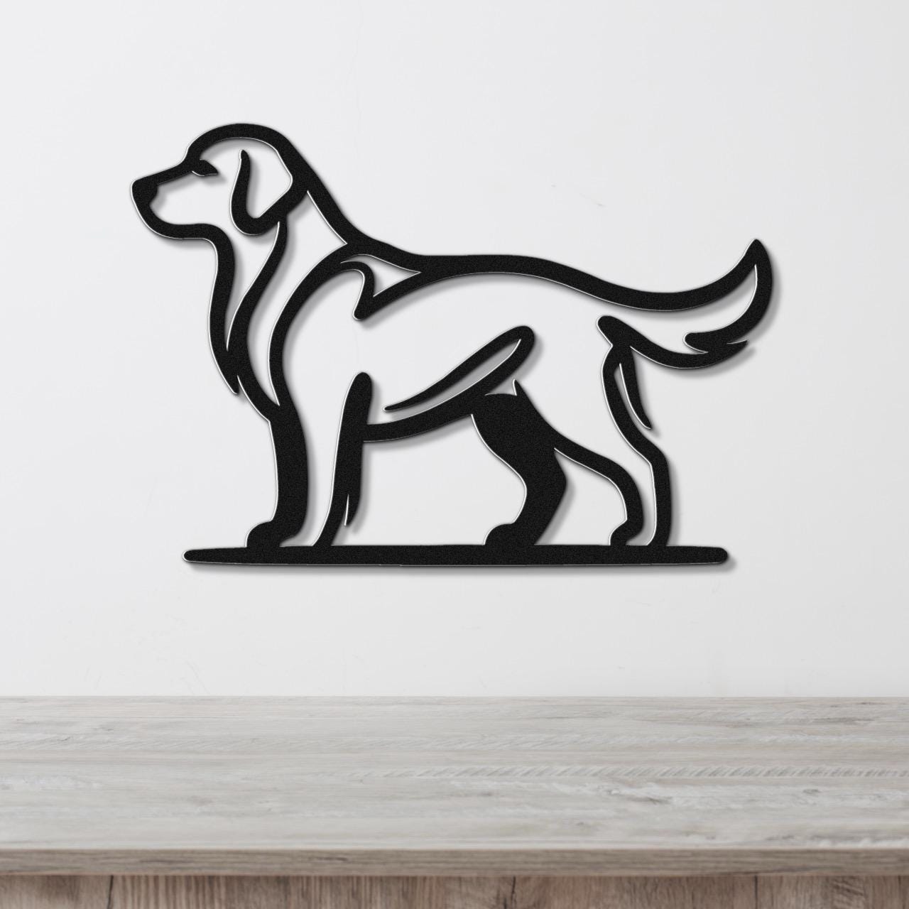 Black metal dog silhouette wall art of a standing Golden Retriever, mounted on a white wall above a light wood surface.