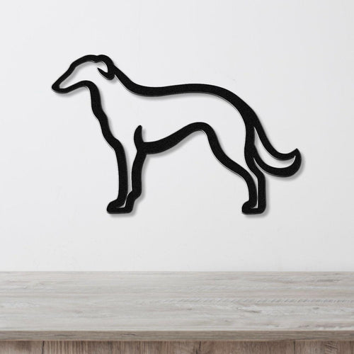 Black metal Borzoi dog wall art silhouette with a smooth, powder-coated finish, mounted on a white wall above a light wood surface.
