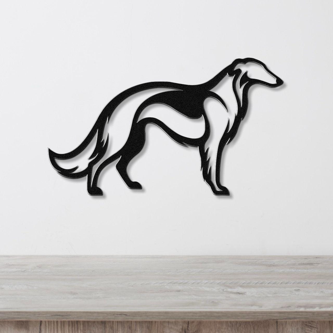 Black metal Borzoi dog wall art with a sleek silhouette design, mounted on a white wall above a light wood surface.
