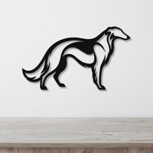 Black metal Borzoi dog wall art with a sleek silhouette design, mounted on a white wall above a light wood surface.
