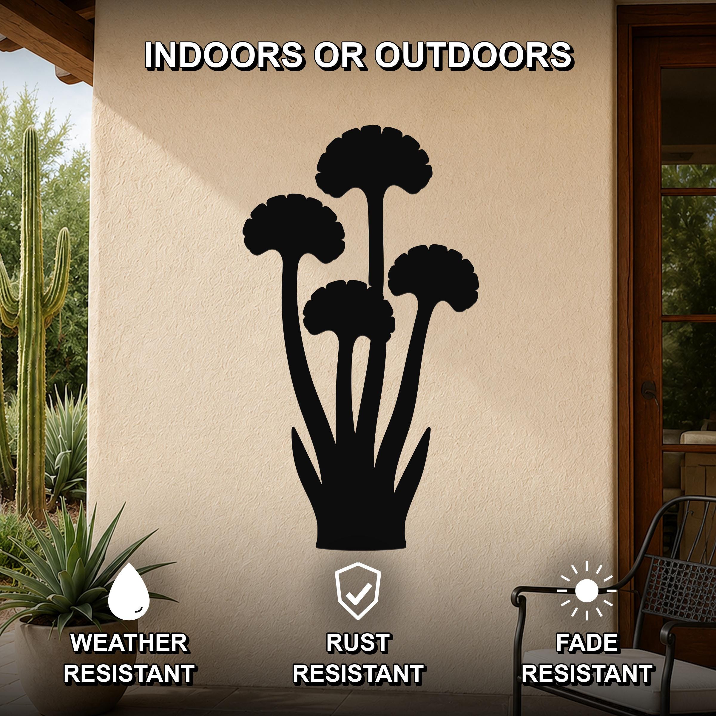 Black metal ginkgo leaf wall art silhouette mounted on an outdoor patio wall, featuring weather, rust, and fade resistant properties.