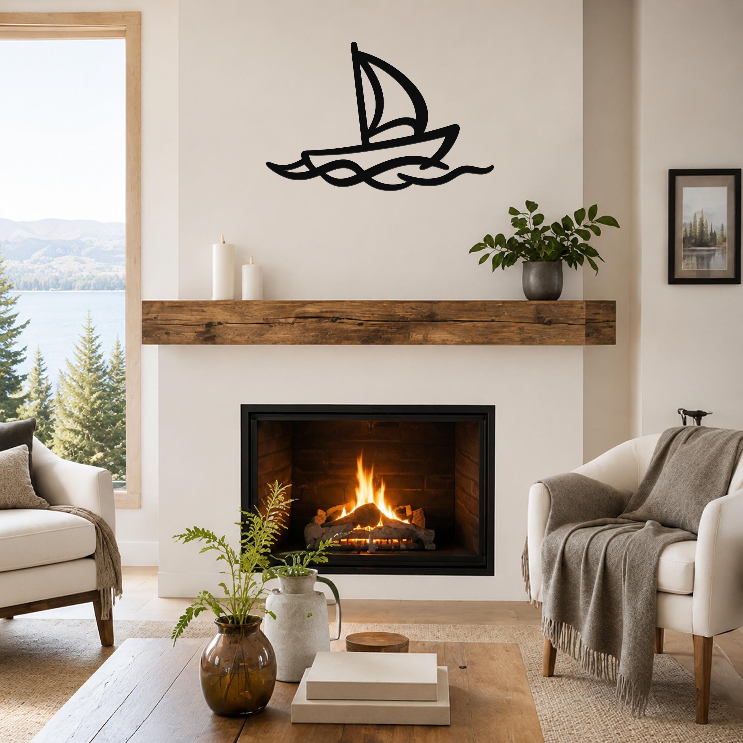 Black metal sailboat wall art with wave cutouts, mounted above a fireplace in a living room.