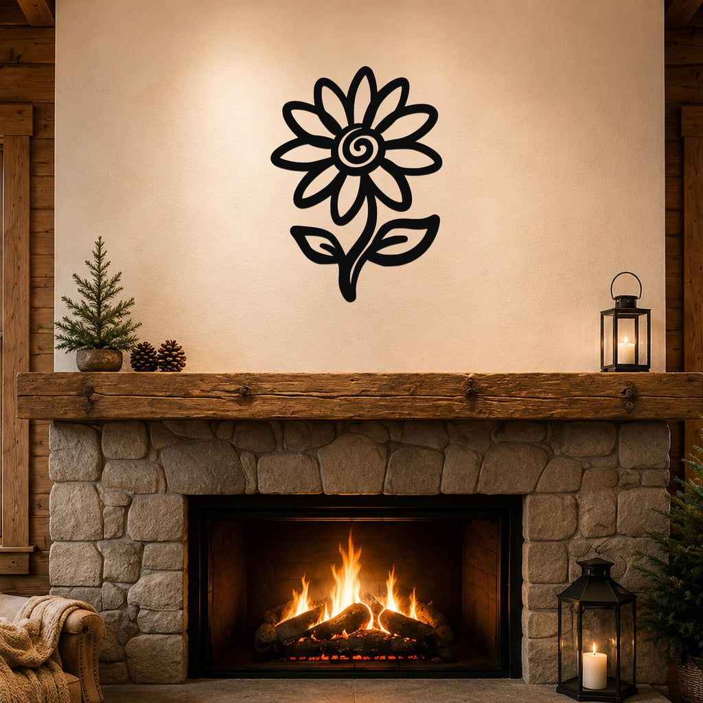 Black metal sunflower wall art with a spiral center and leaf cutouts, mounted above a stone fireplace in a rustic living room.