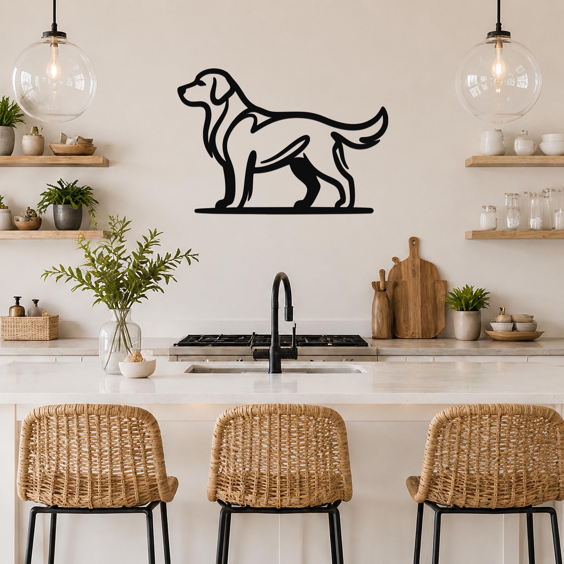Black metal dog silhouette wall art, a golden retriever in profile, mounted on a kitchen wall above a counter with wicker bar stools.