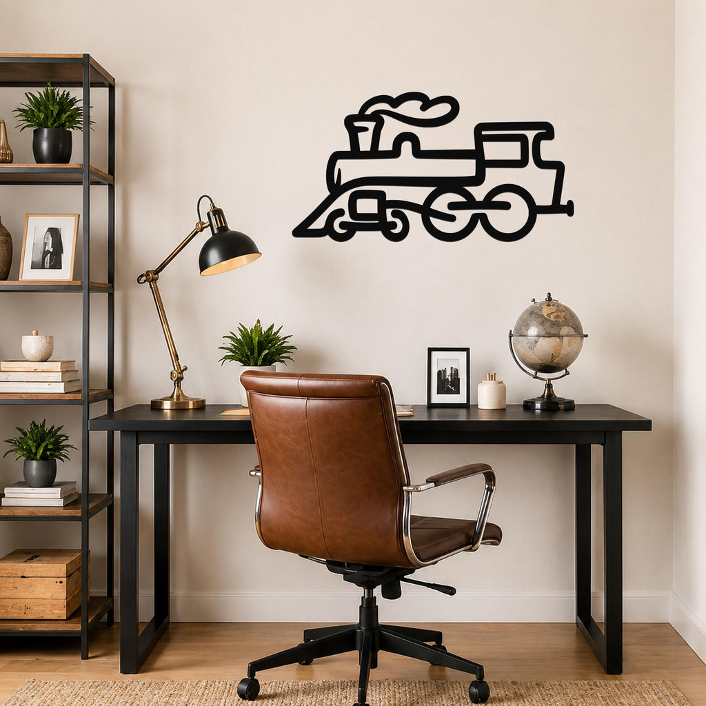 Black metal train wall art with a bold silhouette design, mounted on a wall above a desk in a home office.