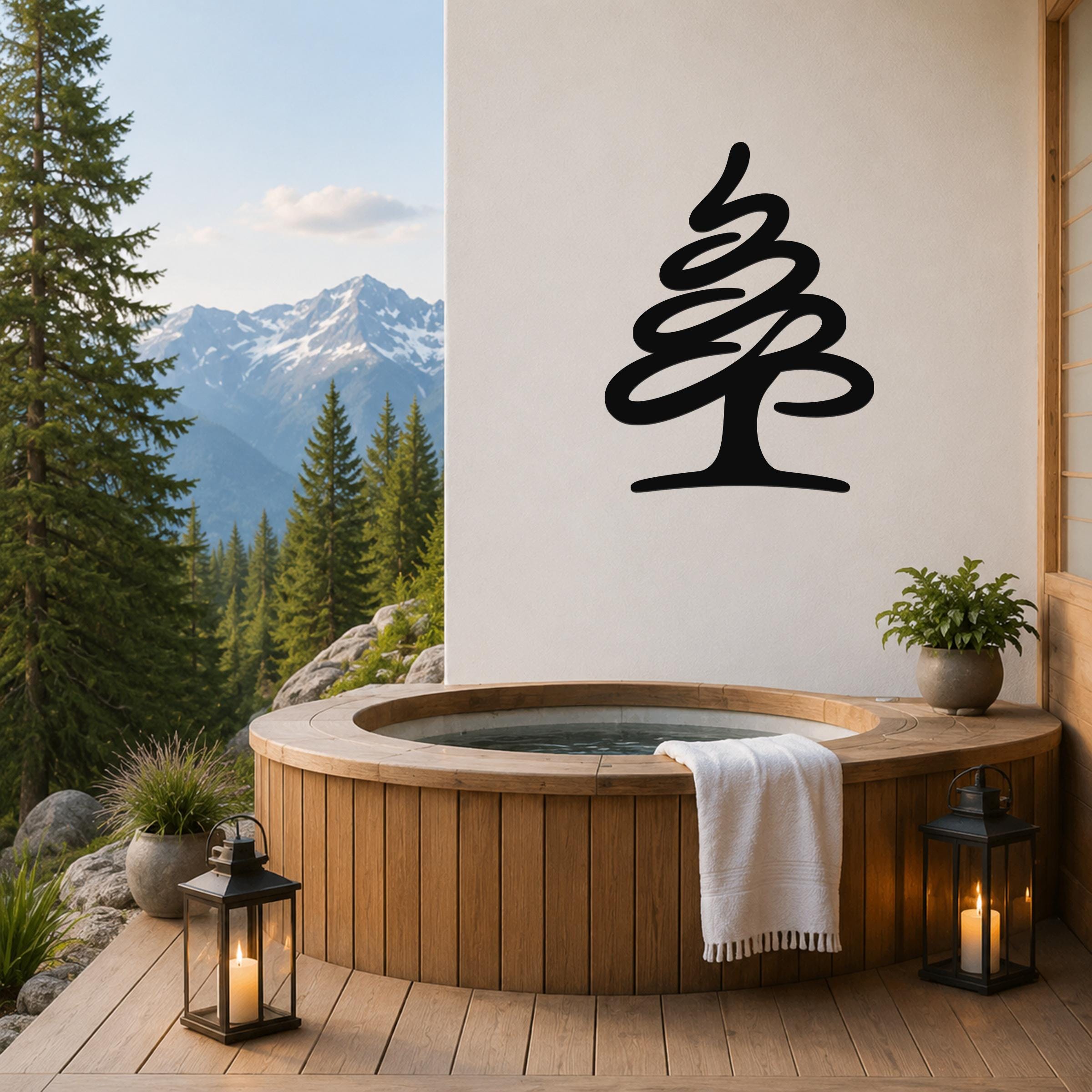 Black metal pine tree wall art silhouette mounted on a white wall above a wooden hot tub on a mountain-view deck.